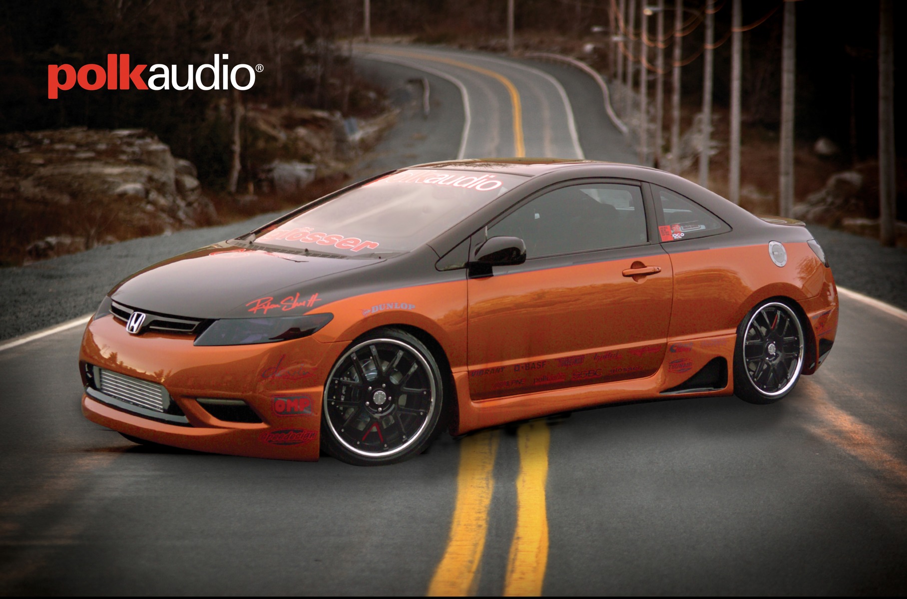 Photographed car and placed into stock background.