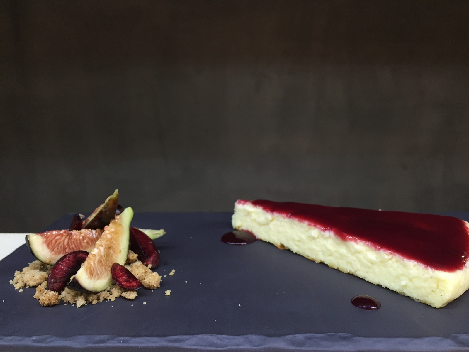 Brie cheesecake, cherry cassis reduction, honey crumble, black mission figs and black cherries