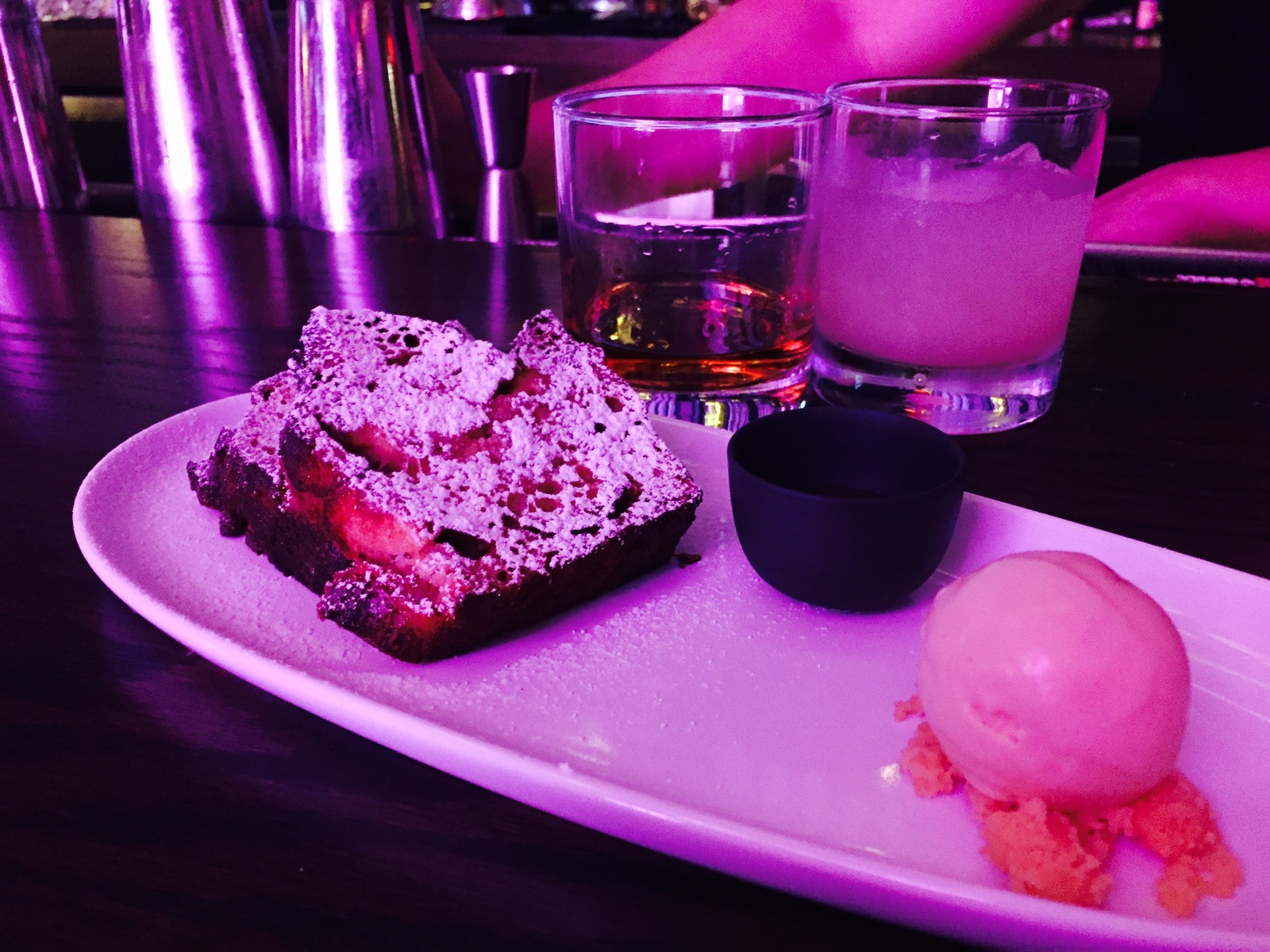 Rosemary and orange bread pudding served with dulce de leche ice cream