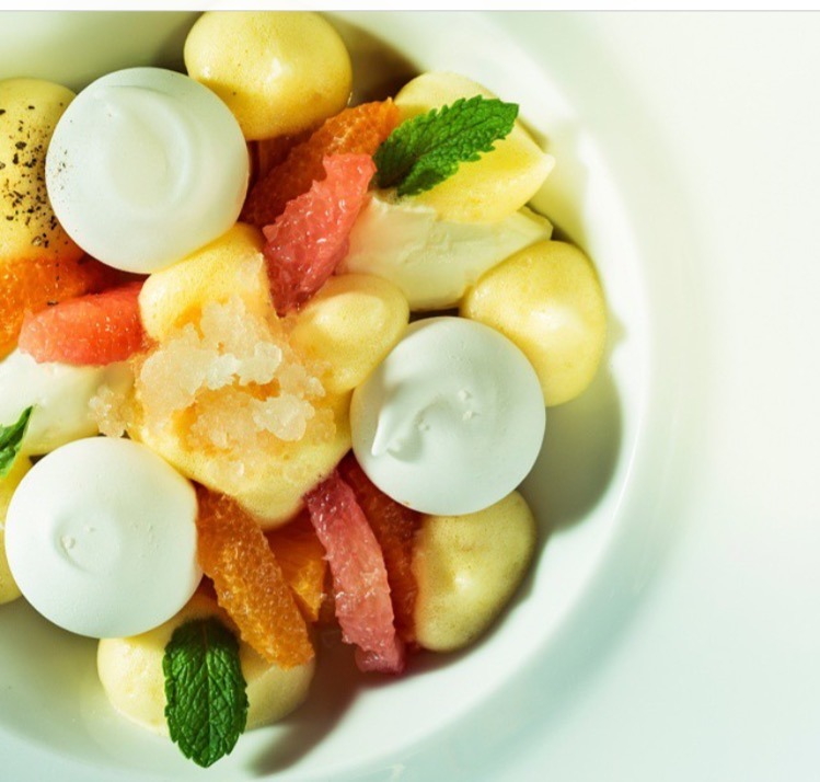 Key lime mousse and key lime pavlova, mandarin foam, passion fruit foam, orange and grapefruit segments