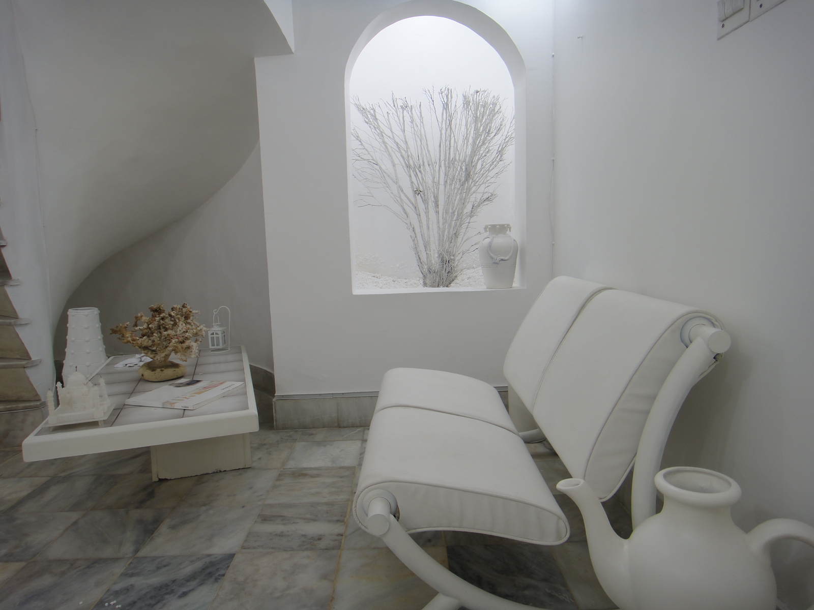 In this project all the existing old furniture was retained and the interior was transformed by using white paint and white leatherite which resulted in huge cost savings with the grace of Allah taala